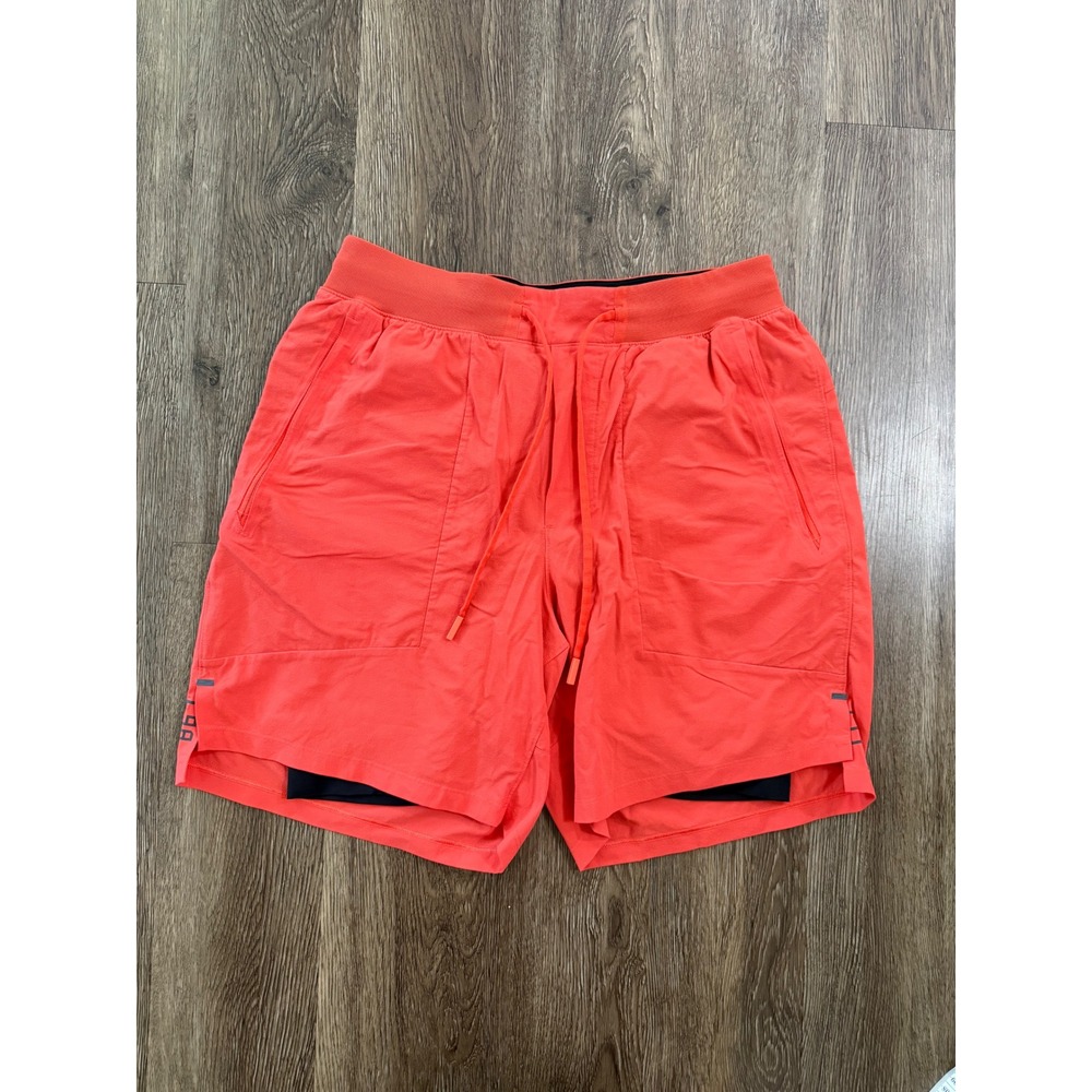 lululemon license to train  Orange Athletic shorts- 7 inch